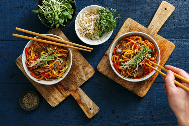 bowls with chow mein - food stock pictures, royalty-free photos & images