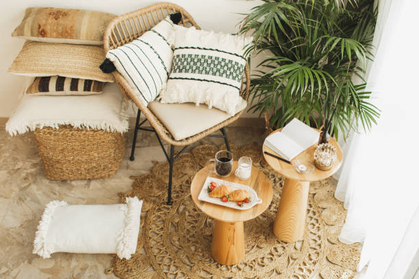 breakfast with croissants and black coffee in cozy room. - home decoration stockfoto's en -beelden