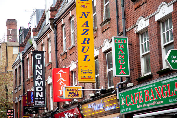brick lane curry houses london - junk food stock pictures, royalty-free photos & images