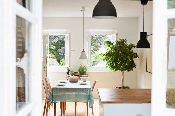 bright modern kitchen and dining room in an old country house - home decoration stock pictures, royalty-free photos & images