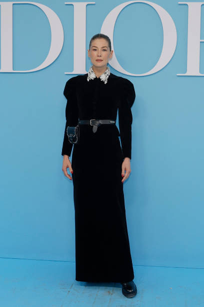 British actress and producer Rosamund Pike poses upon arrival ahead of Dior Women Ready-to-wear Spring-Summer 2025 show as part of the Paris Fashion...