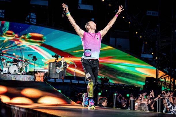 British singer Chris Martin of British band Coldplay performs at Parken Stadium in Copenhagen, on July 5, 2023. The concert is part of the Music of...