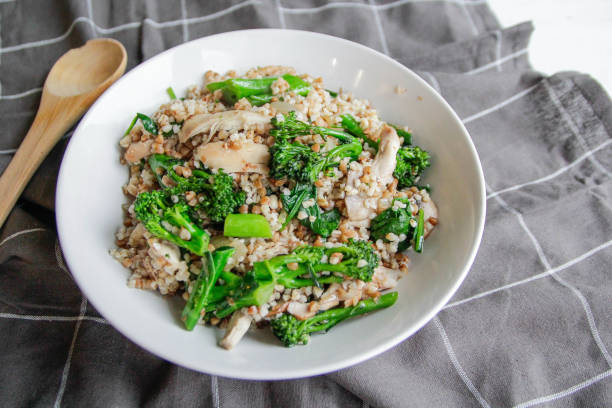 buckwheat with chicken and vegetables - junk food stock pictures, royalty-free photos & images