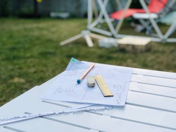 building the wooden geodesic swing chair at garden - garden decoration stock pictures, royalty-free photos & images