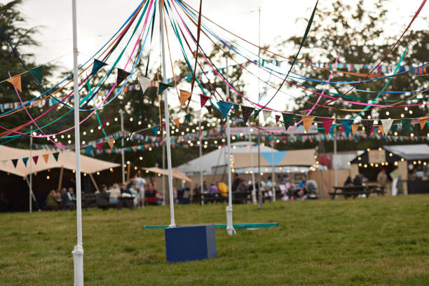 buntings and ribbons decorations at park - concert stock pictures, royalty-free photos & images