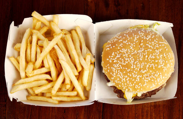 burger & chips - junk food stock pictures, royalty-free photos & images