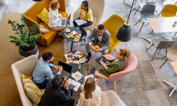 business people having a brunch meeting - food stock pictures, royalty-free photos & images