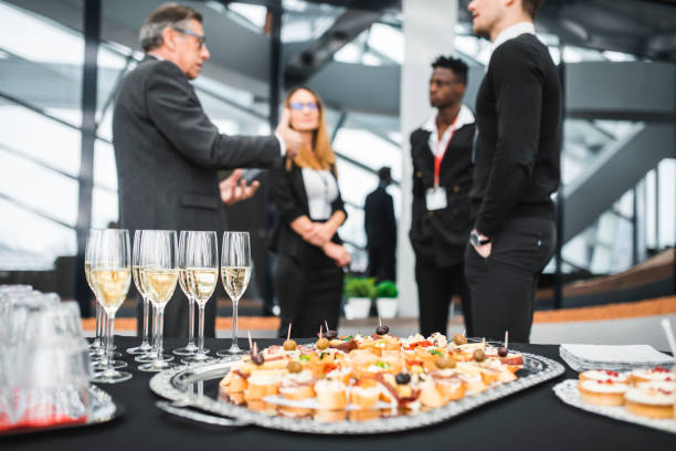 businesspeople having a meet and greet with potential clients - food stock pictures, royalty-free photos & images