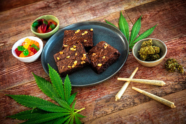 cannabis joints and brownies for medicinal use - food stock pictures, royalty-free photos & images