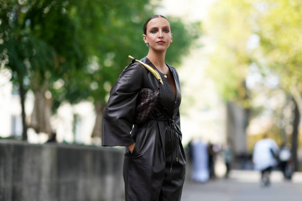 Carla Ginola wears a brown leather jumpsuit, outside Zimmermann, during the Womenswear Spring/Summer 2024 as part of Paris Fashion Week on October...