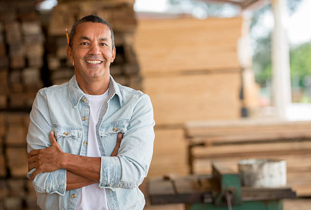 carpenter at his carpentry looking happy - home decoration stock pictures, royalty-free photos & images