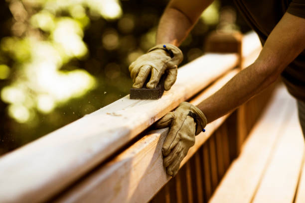 carpenter sanding cedar deck - home decoration stock pictures, royalty-free photos & images