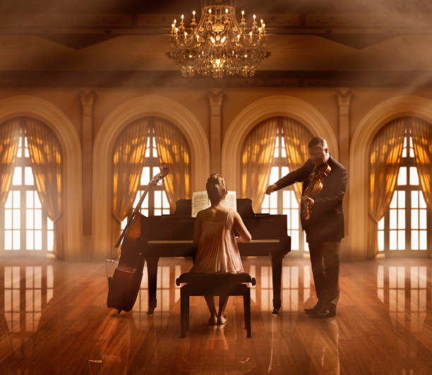 caucasian musicians playing piano and violin - concert stock pictures, royalty-free photos & images