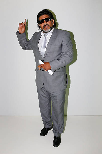 Celebrity impersonator of Diego Maradona attends the Ewa Herzog show during the Mercedes-Benz Fashion Week Berlin Spring/Summer 2016 at Brandenburg...