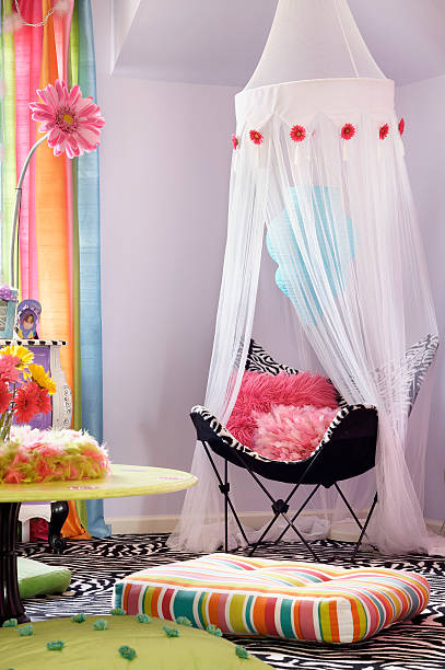 chair in bright girls room - home decoration stock pictures, royalty-free photos & images