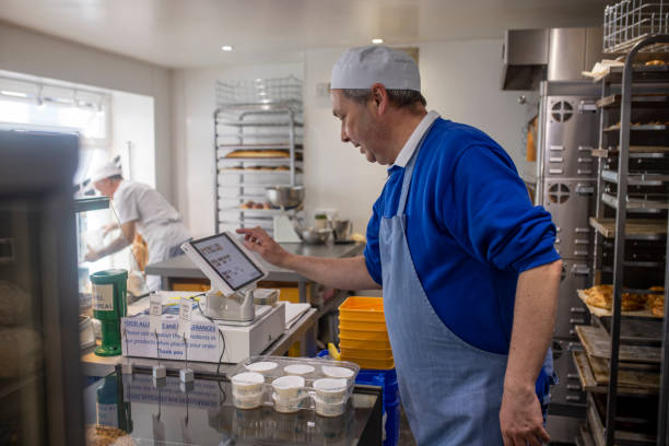 checking out with the till - junk food stock pictures, royalty-free photos & images