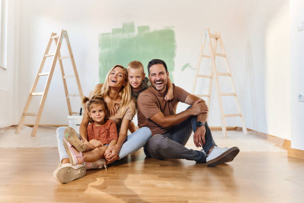 cheerful family enjoying during home renovation process. - home decoration stock pictures, royalty-free photos & images