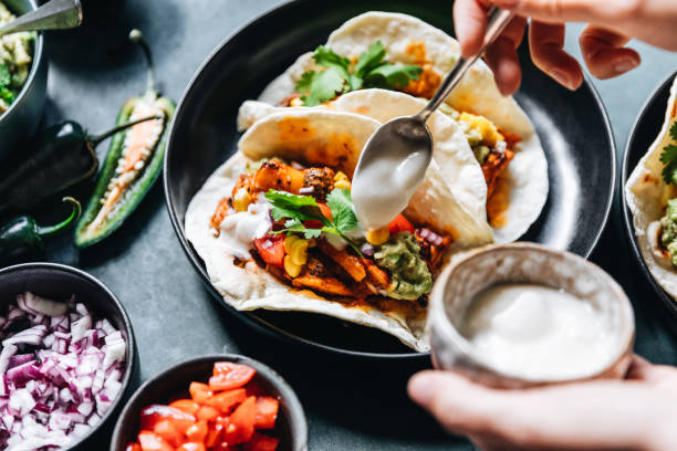 chef preparing vegan tacos - food stock pictures, royalty-free photos & images