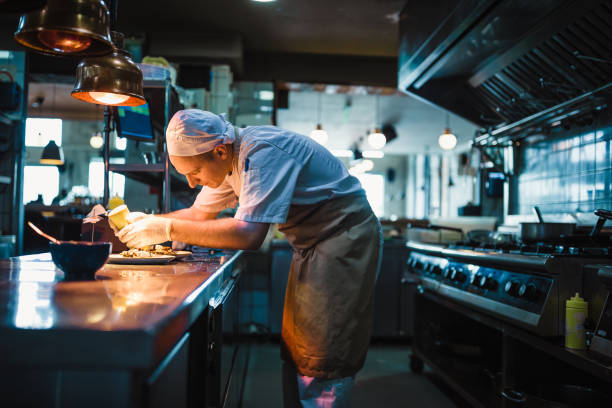 chef serving food - food stock pictures, royalty-free photos & images