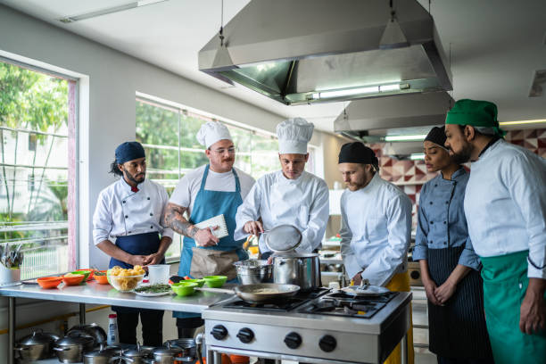 chef teaching students during cooking class - food stock pictures, royalty-free photos & images