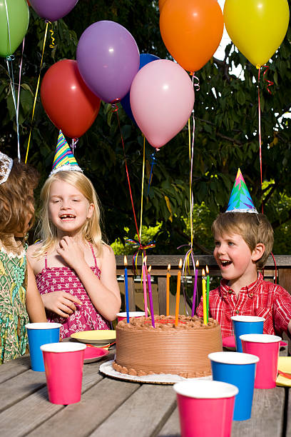 children at birthday party - garden decoration stock pictures, royalty-free photos & images