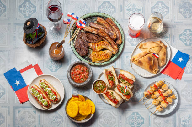 chilean independence day table with traditional festive food for fiestas patrias. dish and drink on 18 september party. - food stock pictures, royalty-free photos & images