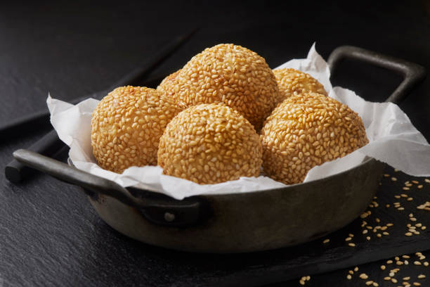 chinese sesame balls with red bean paste - junk food stock pictures, royalty-free photos & images