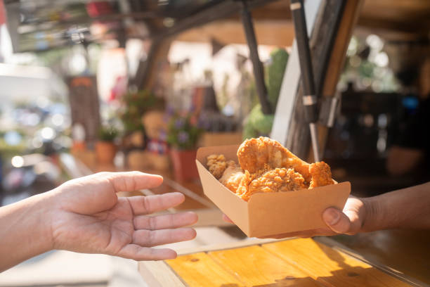 choosing and buying different types of fast food in eat market - junk food stock pictures, royalty-free photos & images