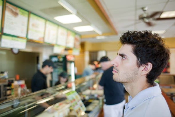 choosing what to eat - junk food stock pictures, royalty-free photos & images