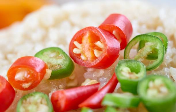 chopped chili pepper on fried rice - junk food stock pictures, royalty-free photos & images