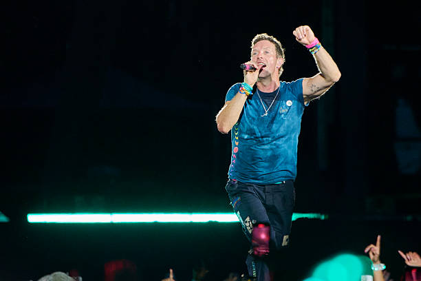 Chris Martin of Coldplay performs at Rogers Stadium on July 07, 2025 in Toronto, Ontario.