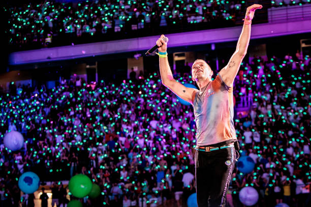Chris Martin of Coldplay performs at Stadio San Siro, on June 25, 2023 in Milan, Italy.