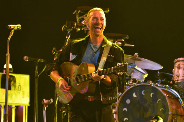 Chris Martin of Coldplay performs on the Pyramid stage during day four of Glastonbury Festival 2024 at Worthy Farm, Pilton on June 29, 2024 in...