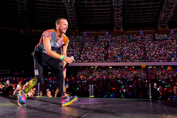 Chris Martin of the band Coldplay perform at Stadio Diego Armando Maradona on June 21, 2023 in Naples, Italy.