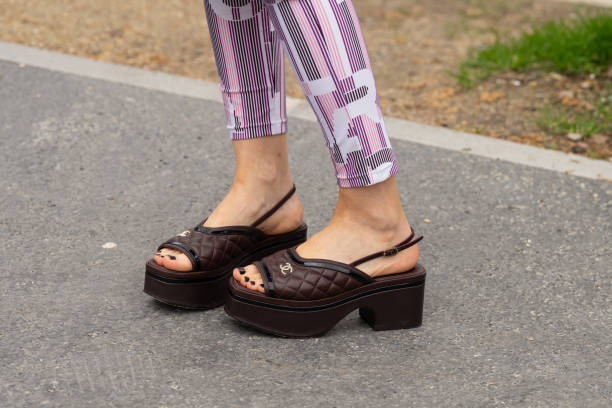 Christine Wuerfel-Stauss wears Chanel shoes and leggings outside the Chanel show during the Womenswear Fall/Winter 2024/2025 as part of Paris Fashion...