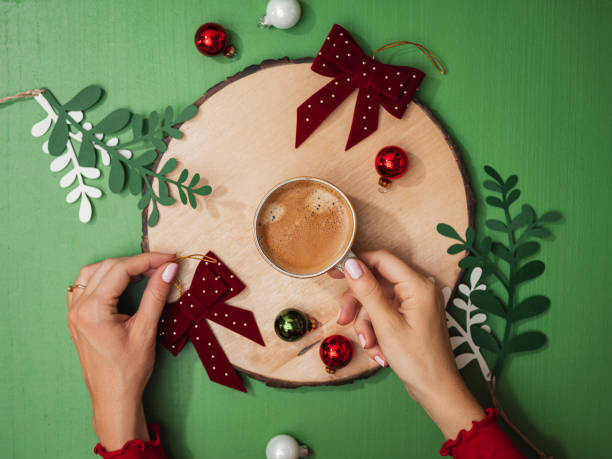 christmas coffee holidays woman hands from above overhead flat lay - home decoration stockfoto's en -beelden