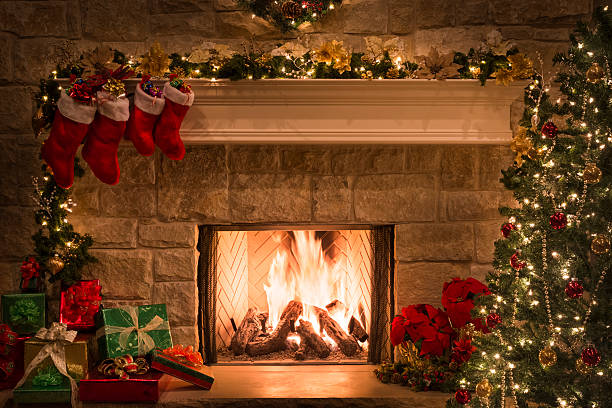 christmas fireplace, stockings, gifts, tree, copy space - home decoration stock pictures, royalty-free photos & images