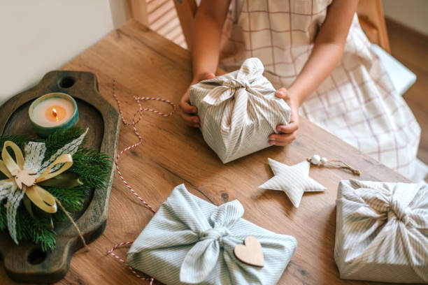 christmas furoshiki wrapping. zero waste concept. - home decoration stock pictures, royalty-free photos & images