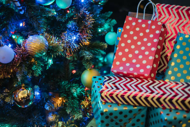 christmas gift well prepare from them for celebrate christmas party at roof top of house - garden decoration stock pictures, royalty-free photos & images