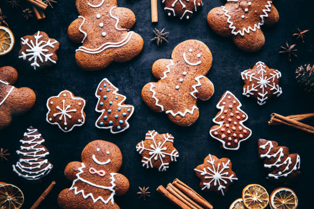 christmas gingerbread man cookies and spices - home decoration stock pictures, royalty-free photos & images