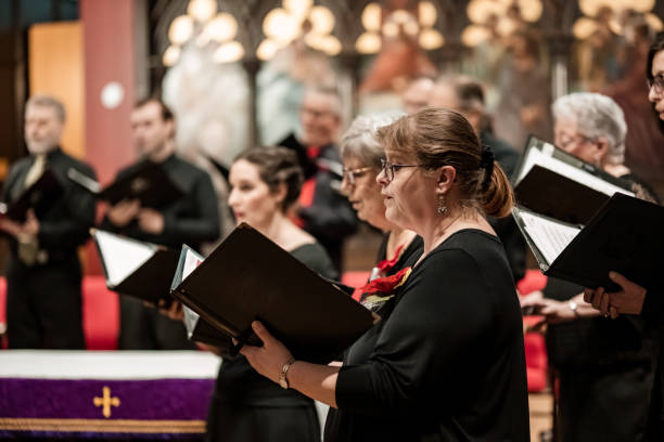 church choir during performance at concert - concert stock pictures, royalty-free photos & images