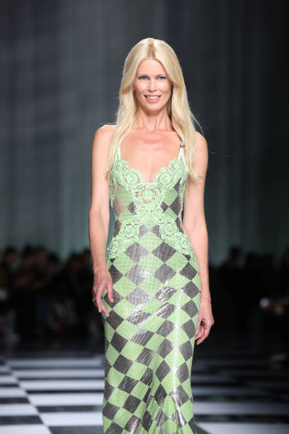 Claudia Schiffer walks the runway at the Versace fashion show during the Milan Fashion Week Womenswear Spring/Summer 2024 on September 22, 2023 in...