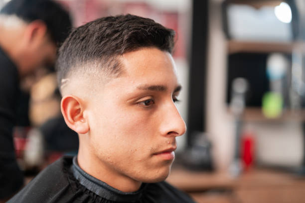 client with his new look in the barber shop - hairstyle stock pictures, royalty-free photos & images