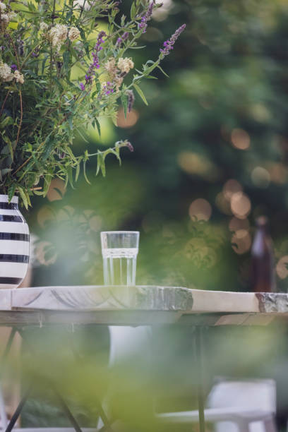 close-up of a flower vase on a table. decoration service. garden party, summer festival, wedding. - garden decoration stock pictures, royalty-free photos & images