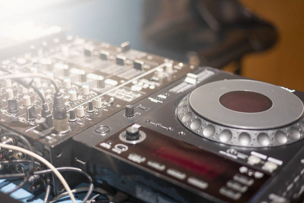 close-up of dj playing record - concert stock-fotos und bilder