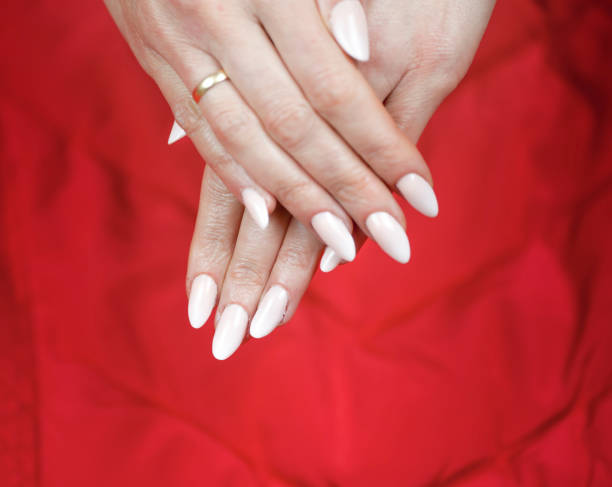 close-up of woman fingers with nail art, baby-boomer-french-manicure - nails art stock pictures, royalty-free photos & images