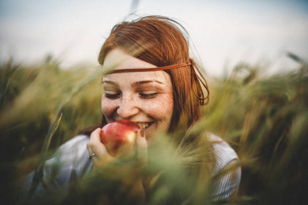 close-up portrait of young woman - food stock pictures, royalty-free photos & images