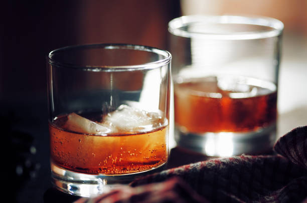 close-up view of the glass of wishky - junk food stock-fotos und bilder