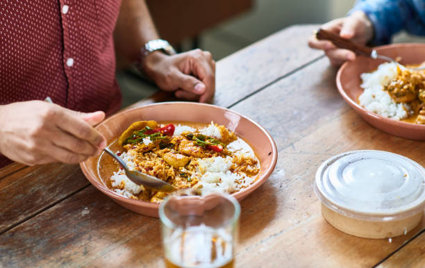 close up of curry on plate with rice - junk food stock pictures, royalty-free photos & images