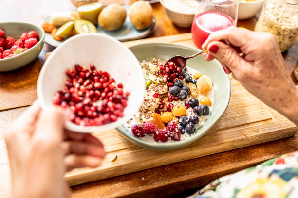 close up of healthy fruit bowl - superfood with yogurt and fruits - food stock pictures, royalty-free photos & images